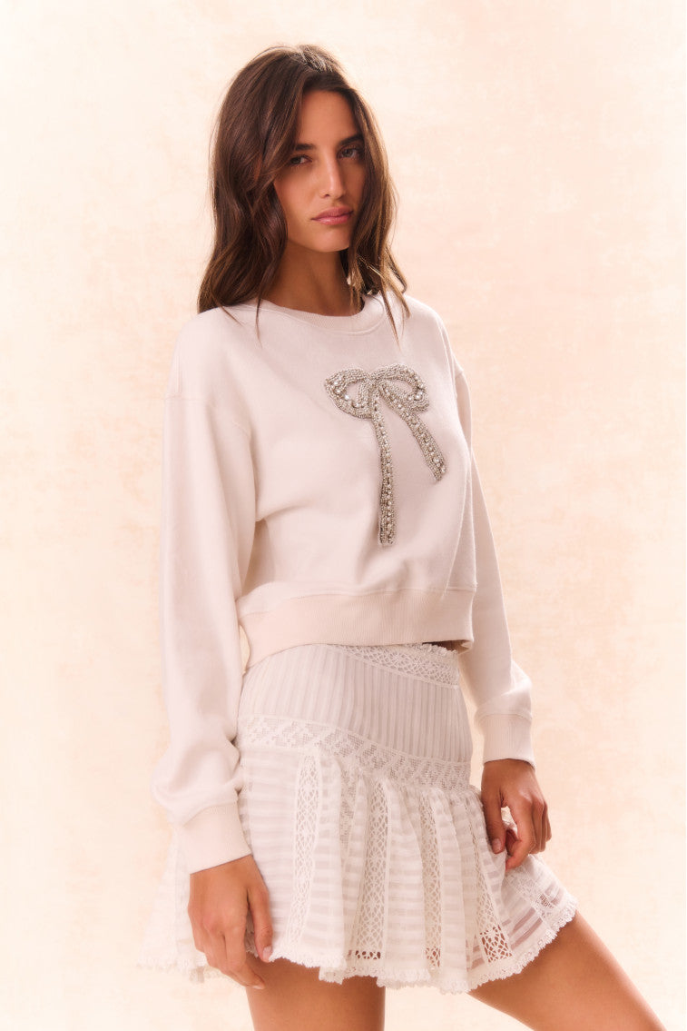 Pull polaire orné d'un nœud Rylan