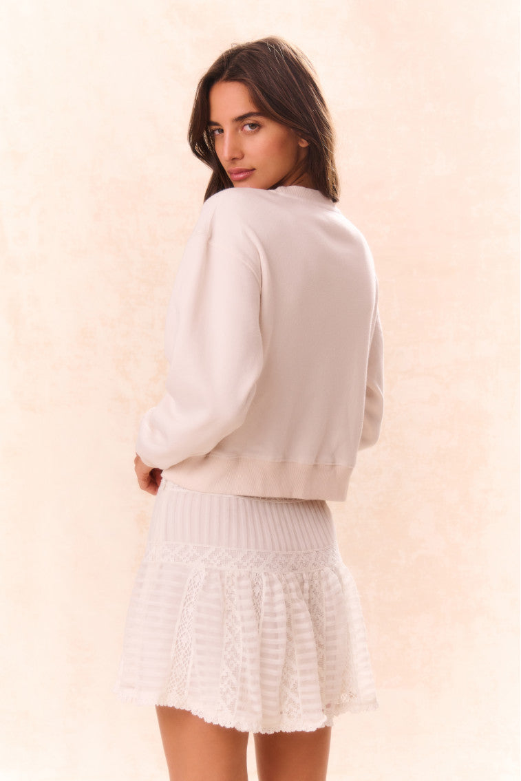 Pull polaire orné d'un nœud Rylan