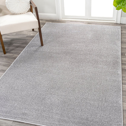 JONATHAN Y Tumbling Solid Low-Pile Area Rug
