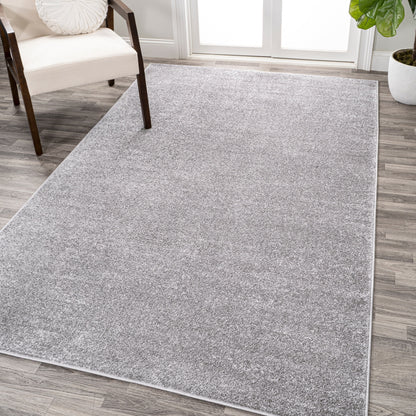 JONATHAN Y Tumbling Solid Low-Pile Area Rug
