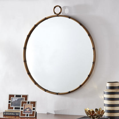 Miroir mural rond Marza finition laiton antique par iNSPIRE Q Modern