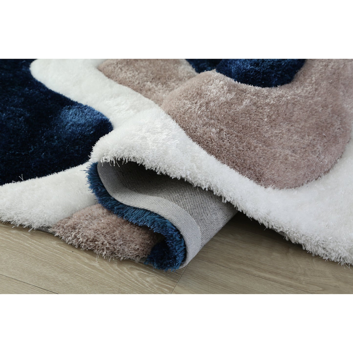 Tapis à poils longs Mateos au design abstrait