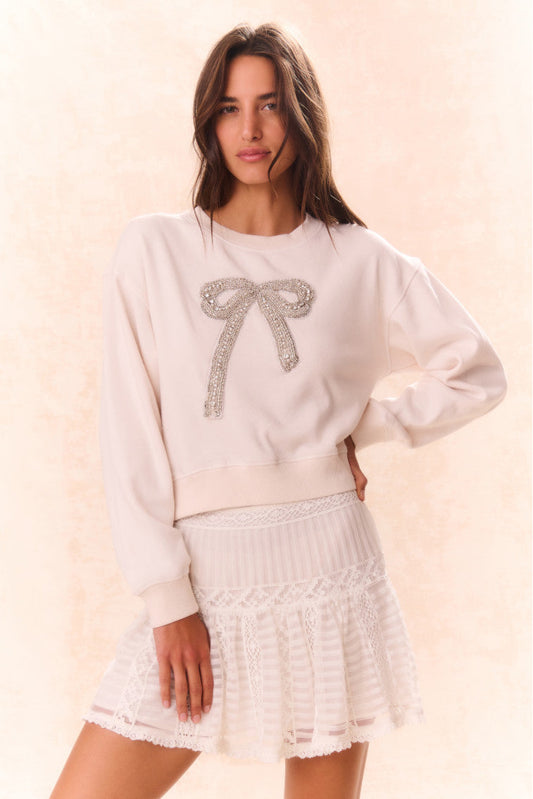 Pull polaire orné d'un nœud Rylan