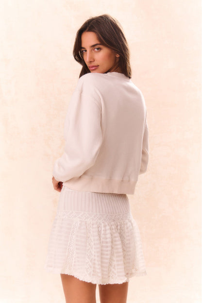 Pull polaire orné d'un nœud Rylan