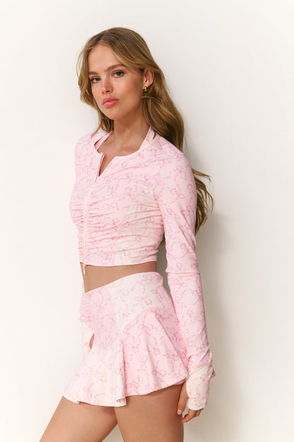 Veste active à imprimé floral et nœud Sindri